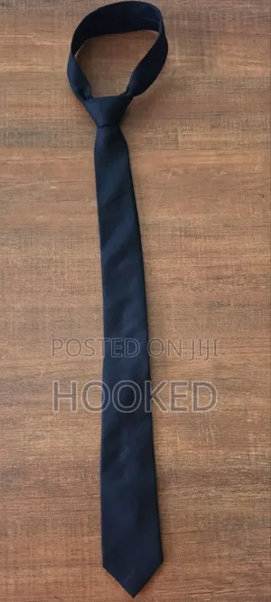 A Black Necktie Will Carry Your Look at Any Given Event.