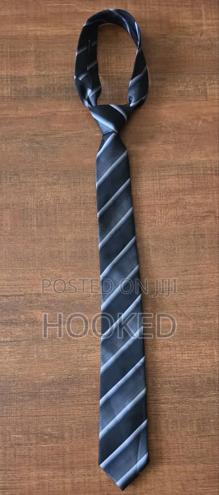 Stripped Ties Scream Classy and So Does This Gray With Black One.