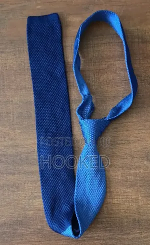 Blue Shades in a Crochet Tie.