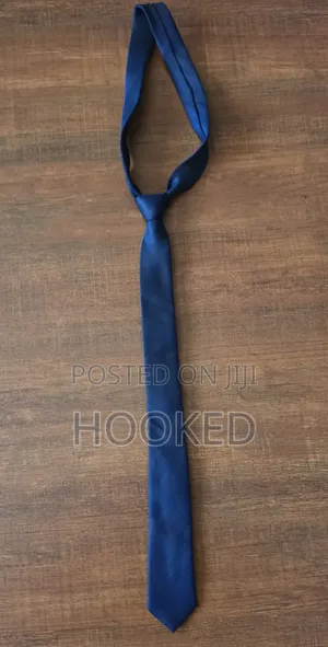 Every Gentleman Needs a Navy Blue Tie.