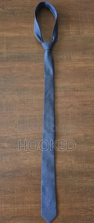 Plain Gray Tie but With Character for a Classic Look.