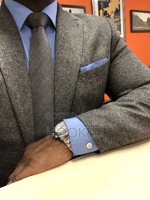 Plain Gray Tie but With Character for a Classic Look.