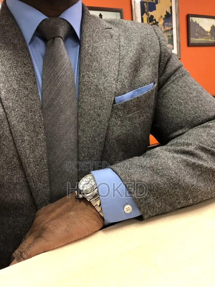 Plain Gray Tie but With Character for a Classic Look.
