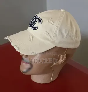 Chanel Cap Distressed in Cream.