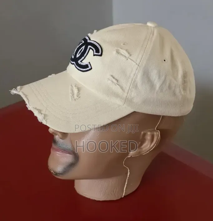Chanel Cap Distressed in Cream.