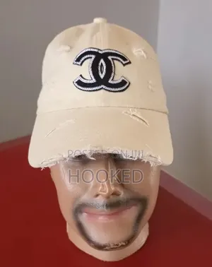 Chanel Cap Distressed in Cream.