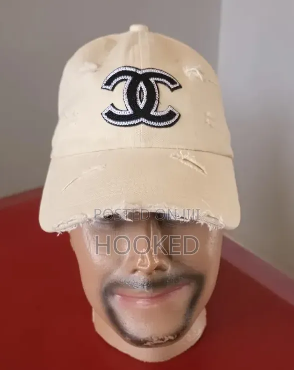 Chanel Cap Distressed in Cream.