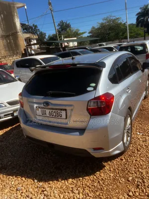 Subaru Impreza 2.0i Limited PZEV 4dr Hatchback AWD (2.0L 4cyl CVT) 2015