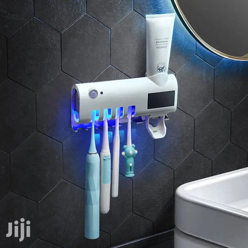 Toothpaste Dispenser Brush Holder And Disinfector