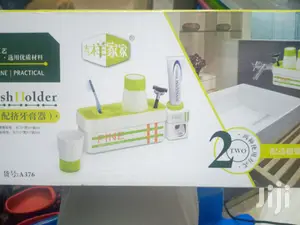 Toothpaste Dispenser/ Toothbrush Holder