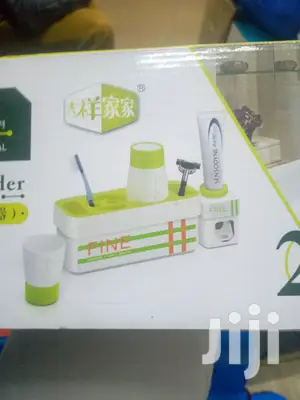 Toothpaste Dispenser/ Toothbrush Holder