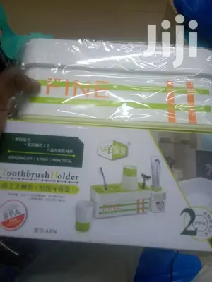 Toothpaste Dispenser/ Toothbrush Holder