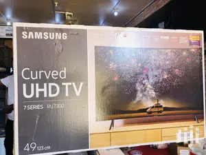 Photo - Samsung Smart Tv 49 Inch Uhd 4k Curved