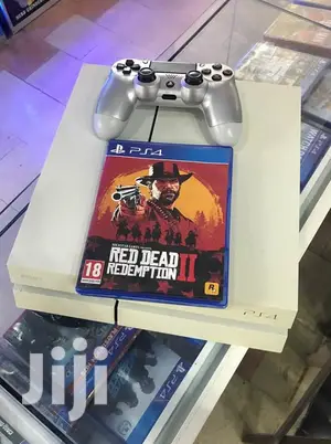 Uk Used Ps4 Comes With 2 Pads, Fifa21 and Other Game