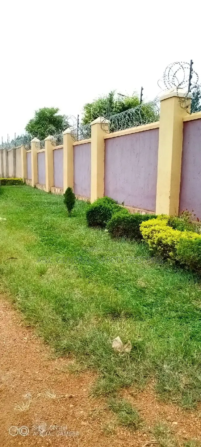 Electric Wire Fence With Razor Wire For Your Home Security