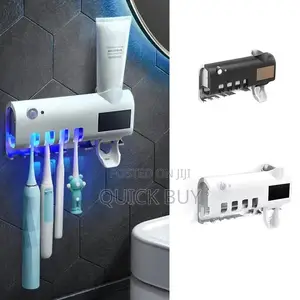 Tooth Brush Sterilizer/Tooth Paste Dispenser