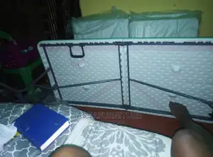 Foldable Plastic Table With Metallic Stands