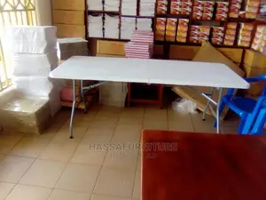 Foldable Plastic Table With Metal Stands