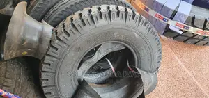 700r15 Mudgrip Behind Tires