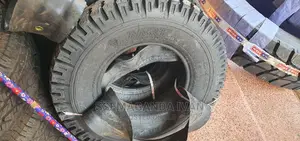 700r15 Mudgrip Behind Tires
