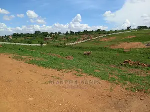 Posh 100*100 in Tarmacked Estate of Kasangati on Sell