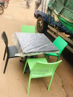 A Set of Strong Imported Table and 4 Plastic Chairs