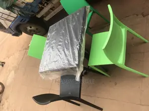 A Set of Strong Imported Table and 4 Plastic Chairs