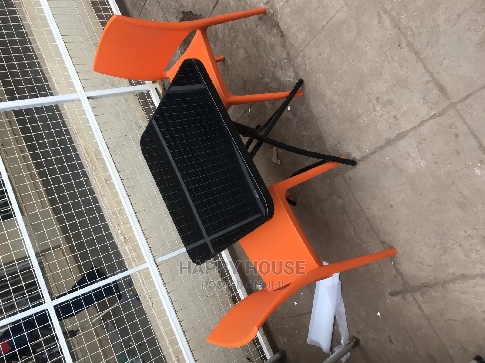 Foldable Table and Two Strong Plastic Chairs