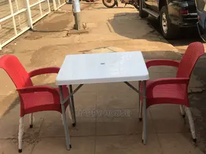 Set of Table and Two Plastic Chairs